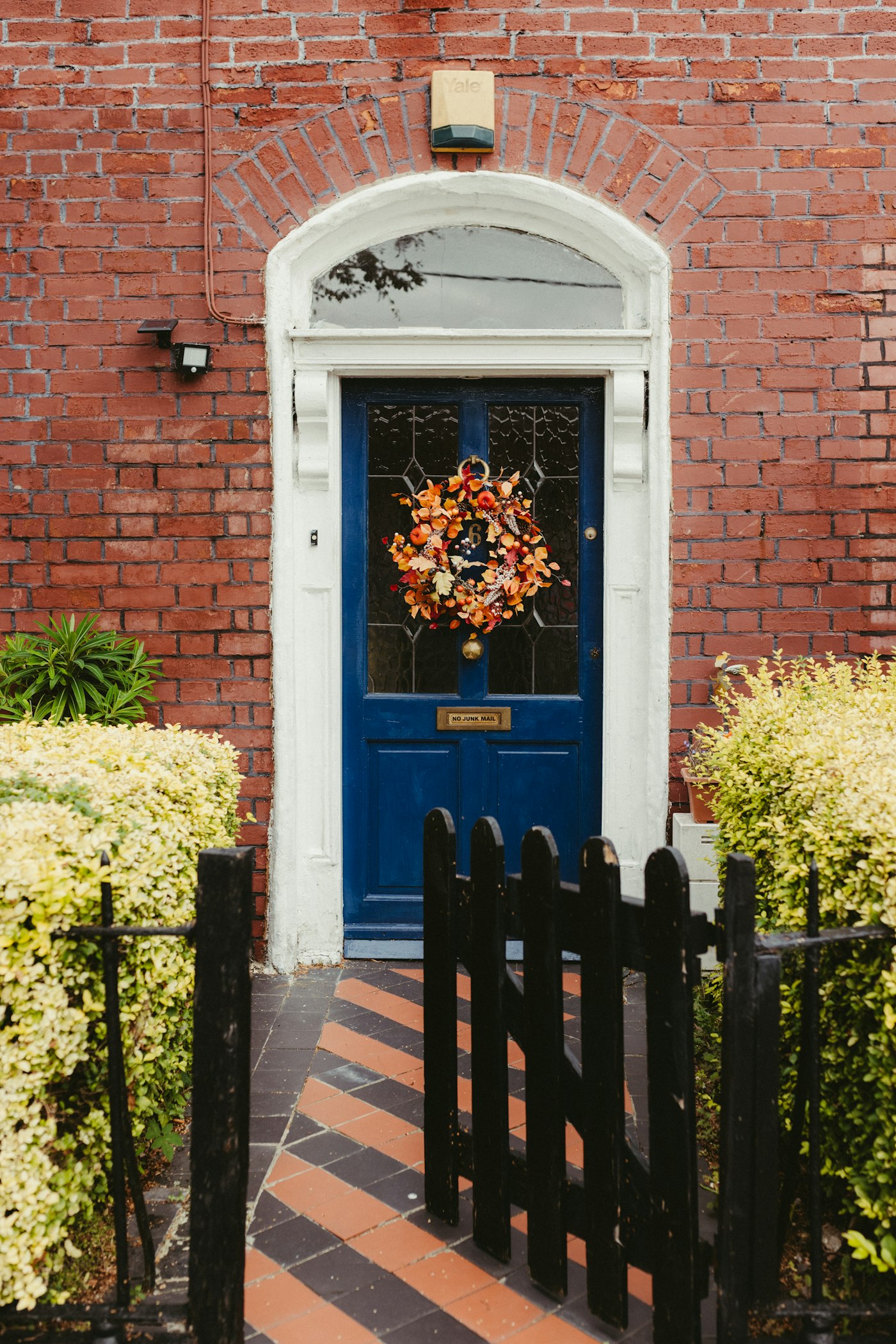 A welcoming blue front door and garden entrance at a Dublin home